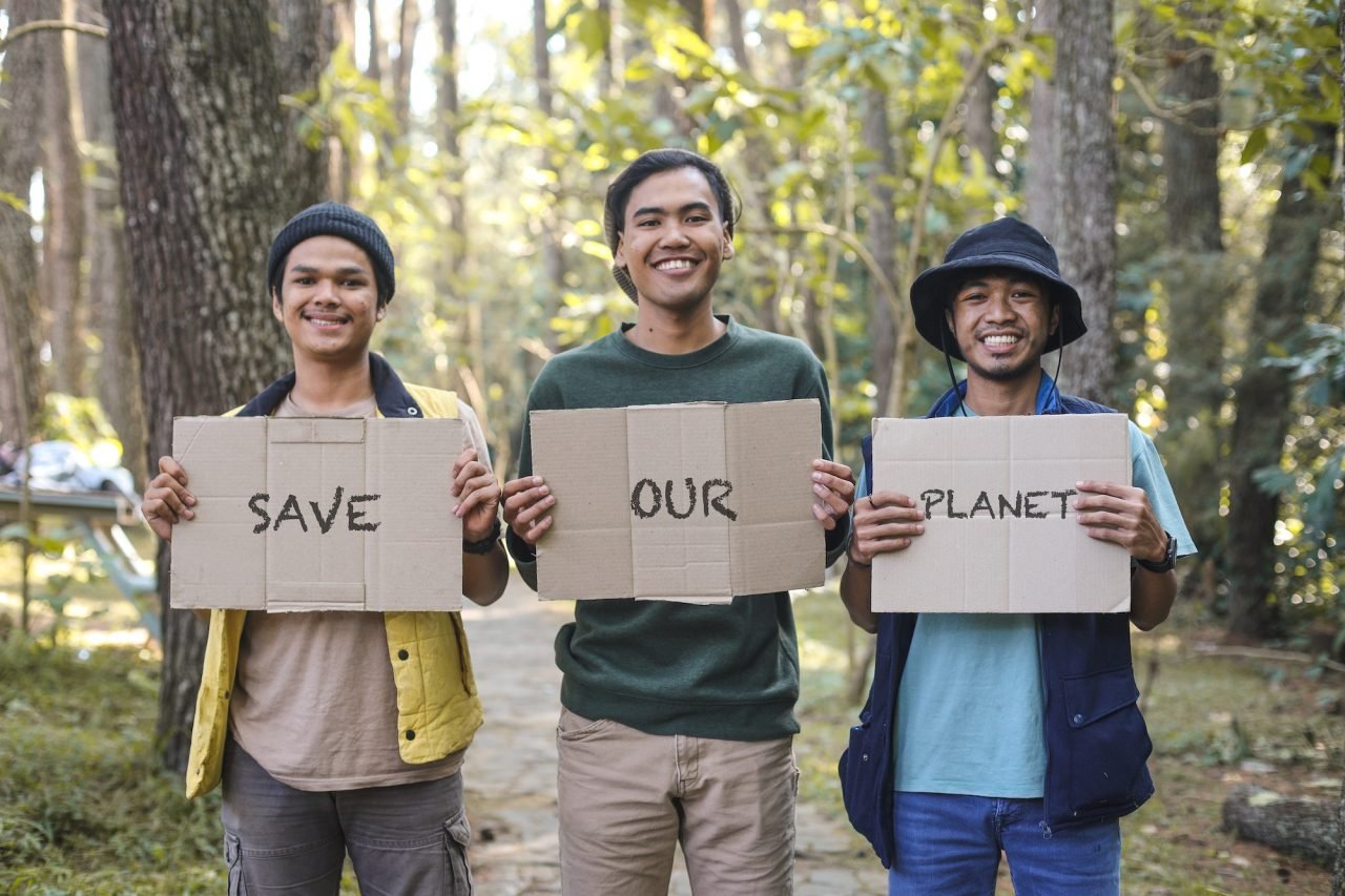 Diverse-men-with-statement-for-clean-and-safe-nature-save-our-planet